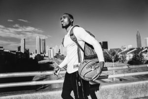 Unconquered worked with Point3 basketball for their sports marketing, just like this image of a player walking through Atlanta.