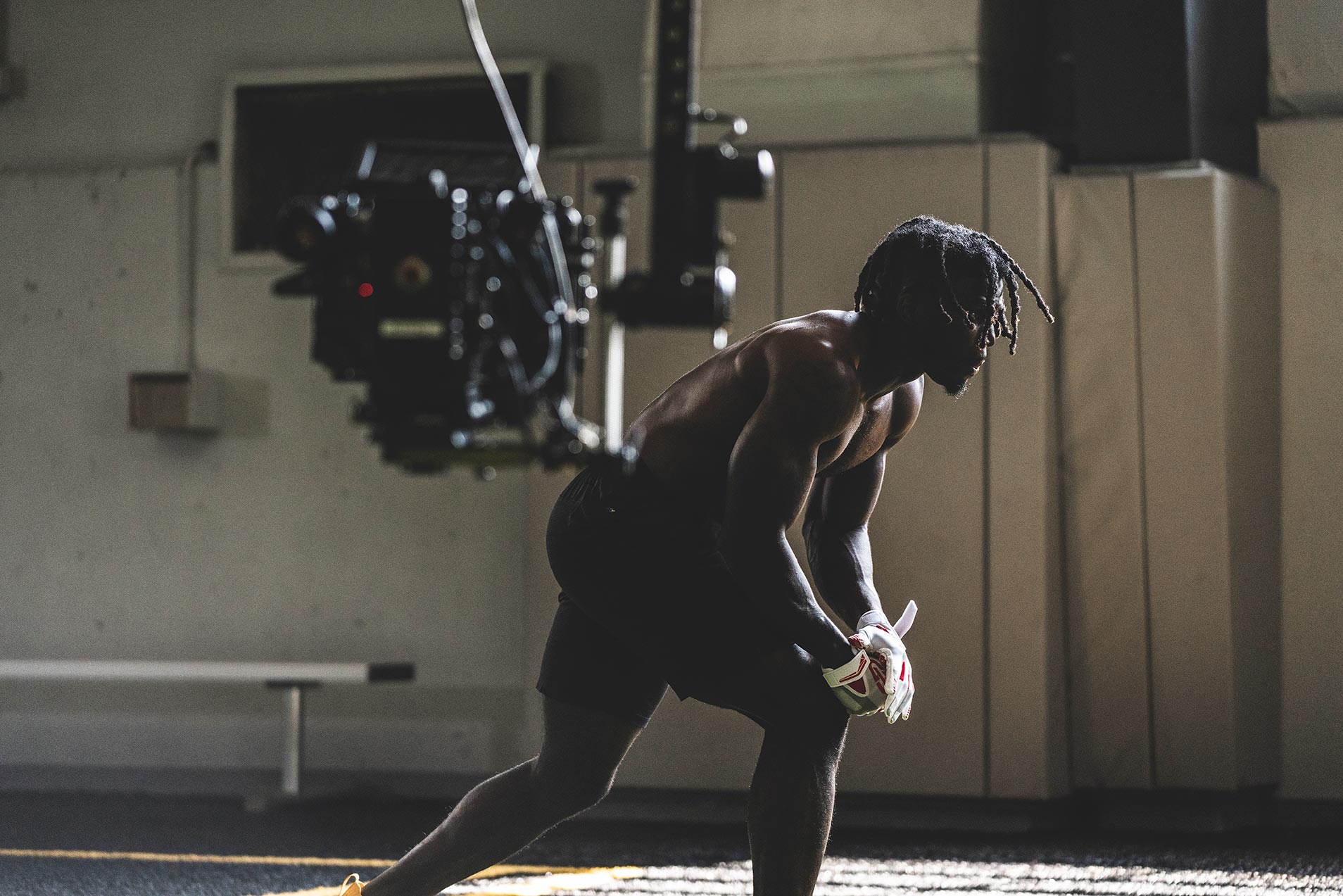 NFL star, Tyreek Hill, BTS with Unconquered, a New York production and creative agency.